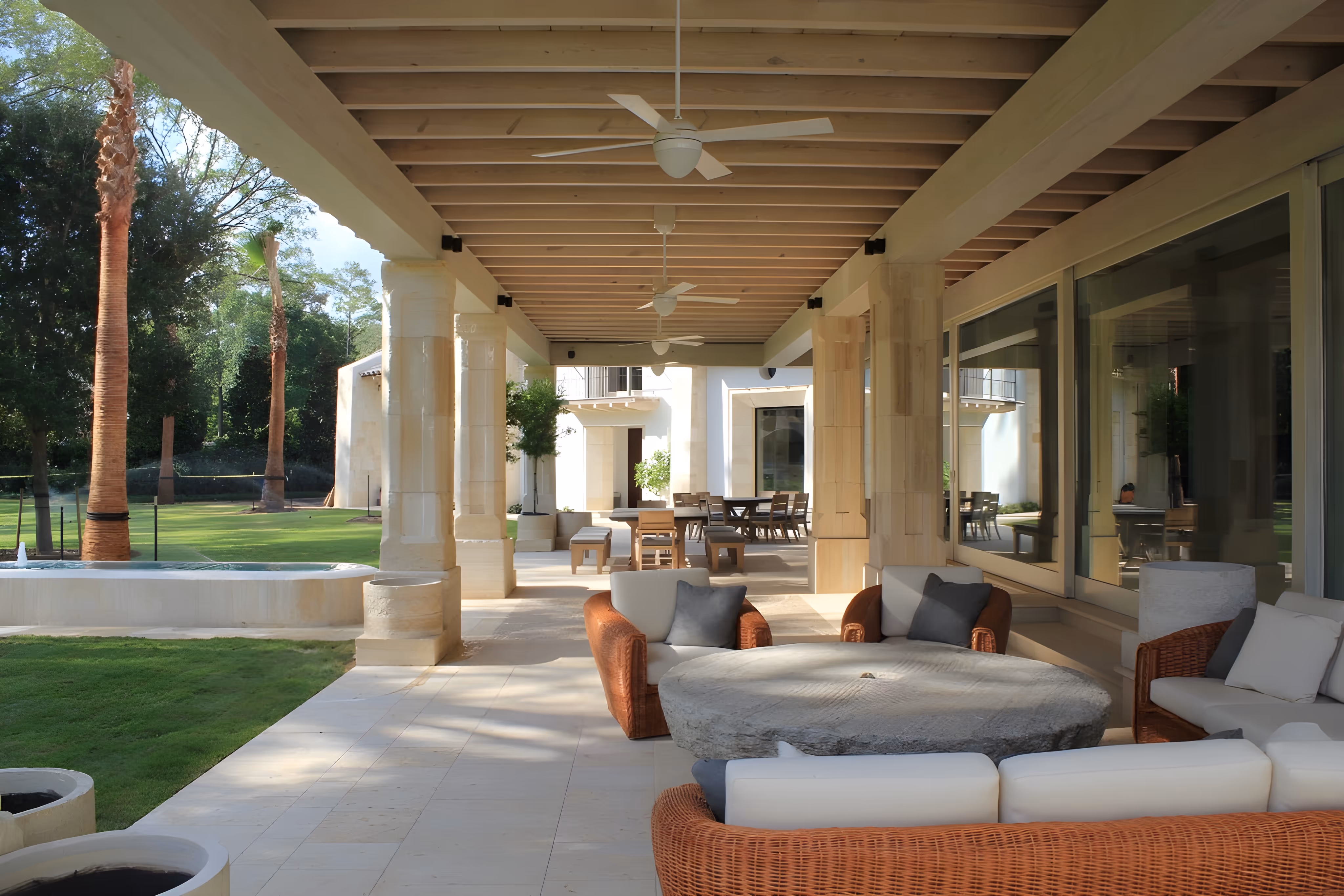 Outdoor seating in Spanish villa style home.